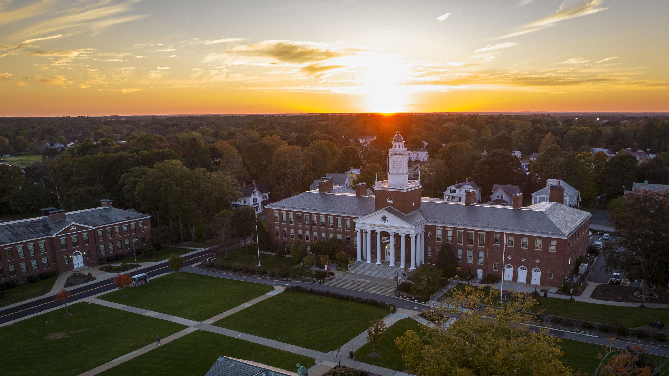 A photo taken by a drone of the sun above Boyden Hall.